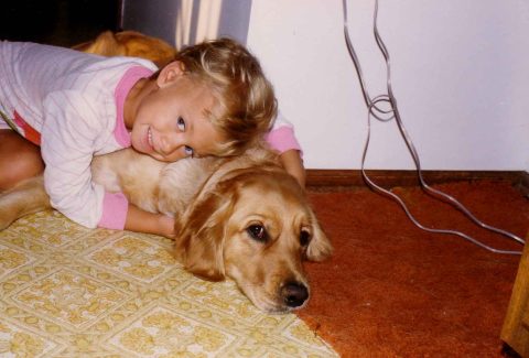 a little girl and her dog